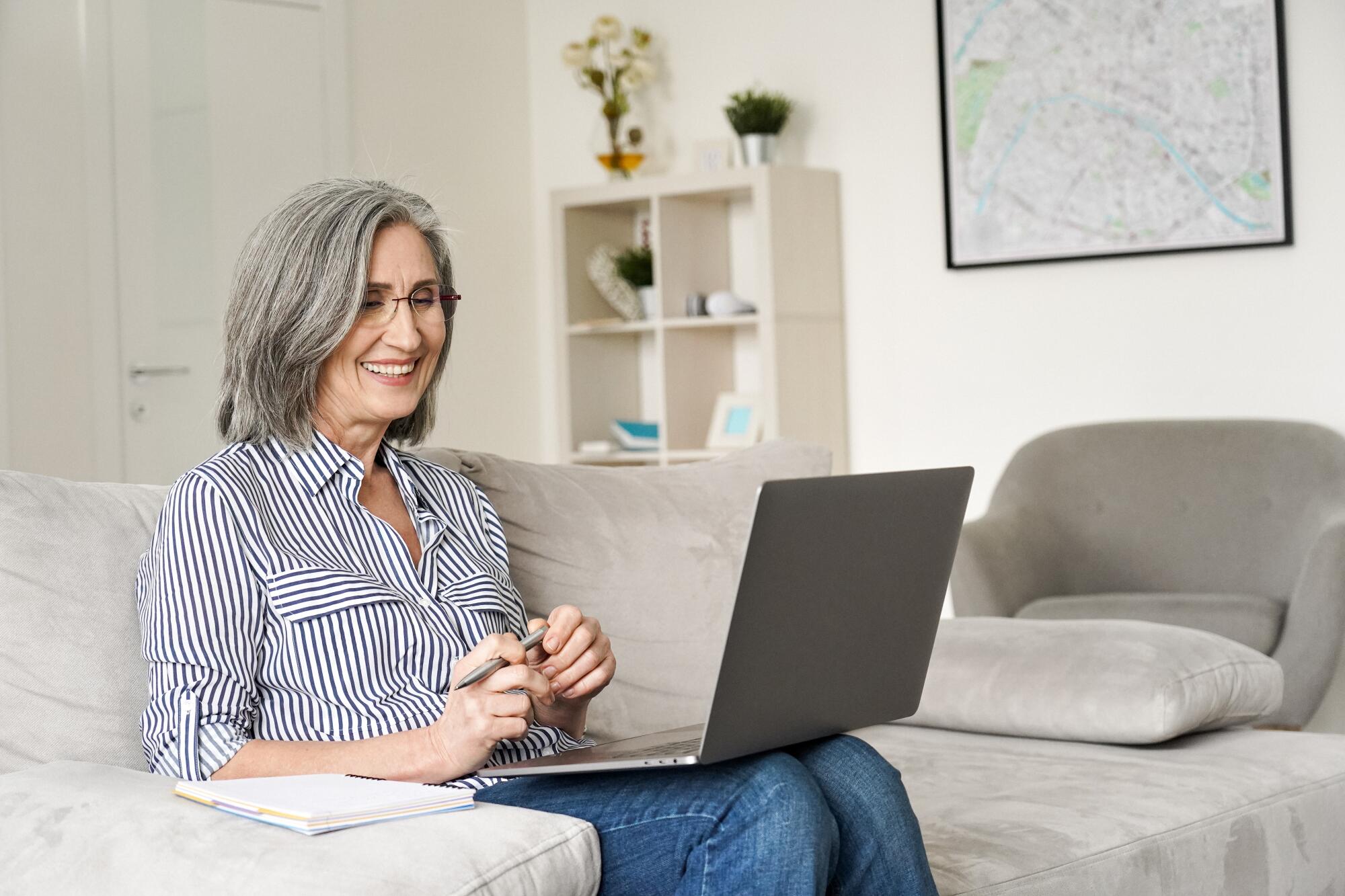 Happy,Mature,Older,Senior,Adult,Professional,Business,Woman,Working,On