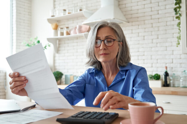 Senior,Mature,Business,Woman,Holding,Paper,Bill,Using,Calculator,,Old Senior,Mature,Business,Woman,Holding,Paper,Bill,Using,Calculator,,Old