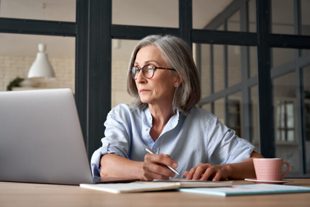 Serious,Mature,Older,Adult,Woman,Watching,Training,Webinar,On,Laptop Serious,Mature,Older,Adult,Woman,Watching,Training,Webinar,On,Laptop