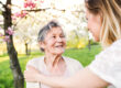 Elderly,Grandmother,And,Granddaughter,In,Spring,Nature.