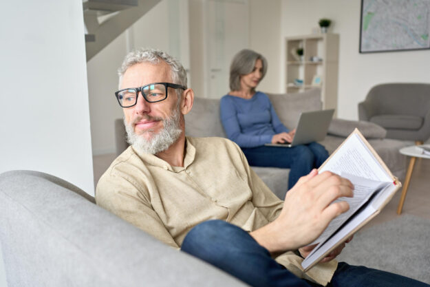Happy,Older,Senior,Man,Husband,Wearing,Glasses,Reading,Book,Relaxing