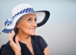 Portrait of a senior woman in summer near lake