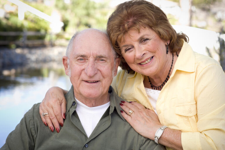 Happy Senior Couple Enjoying Each Other in The Park. Happy Senior Couple Enjoying Each Other in The Park.