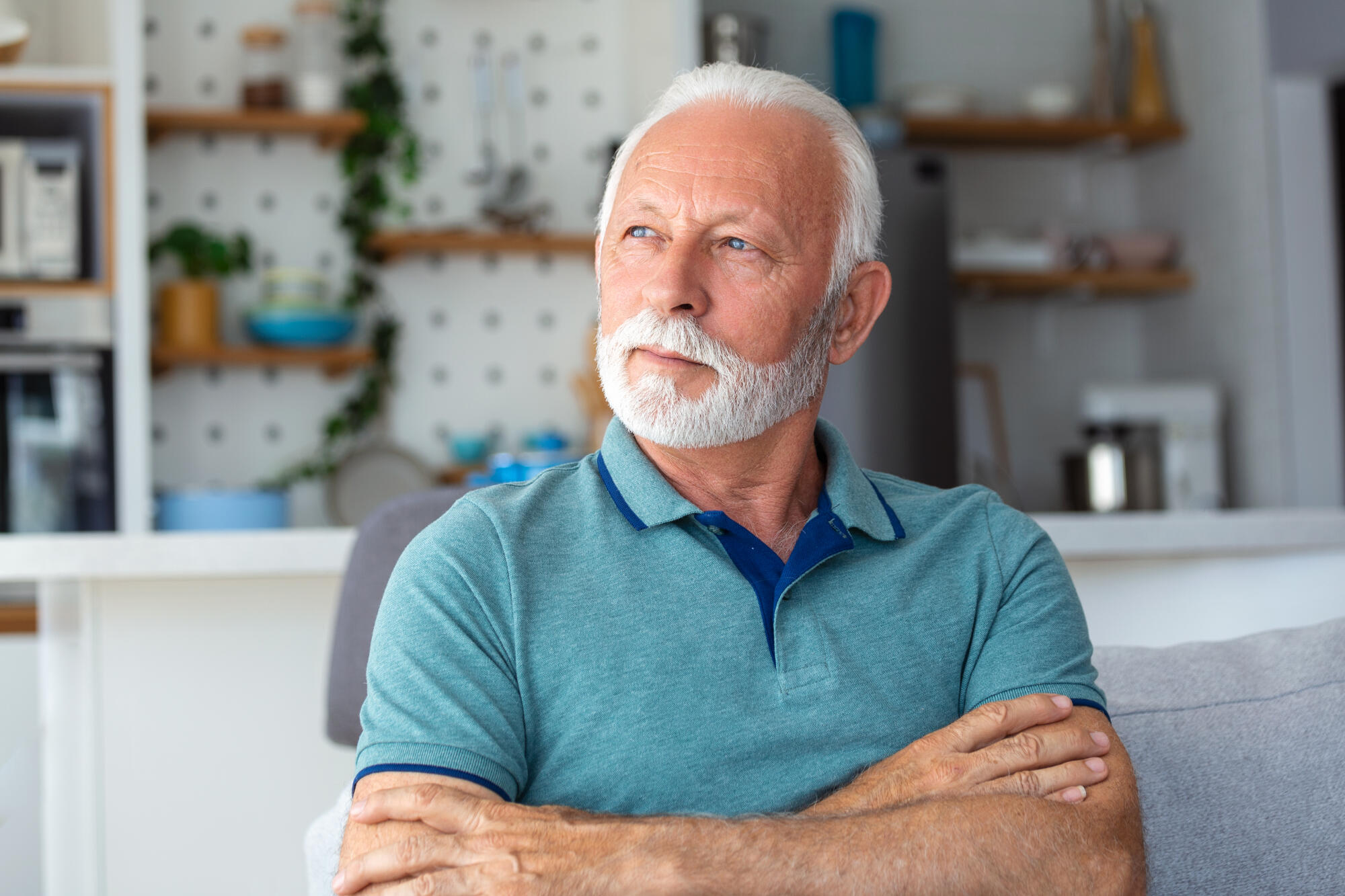 Bored tired sad mature man depressed lonely having no visitors of his children. Divorce , bachelor , health problems concept. Lockdown, unemployment, needless man on social distance