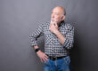 Pensive mature man looking away, copy space