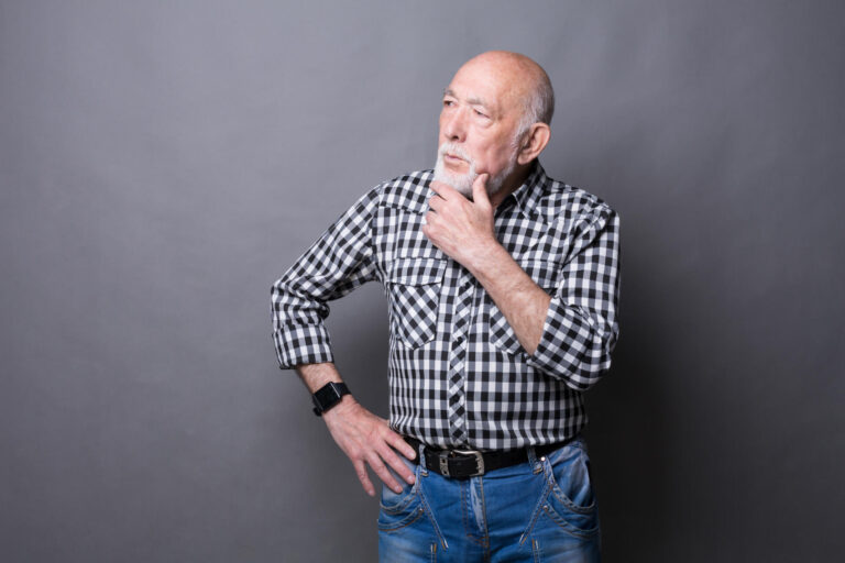 Pensive mature man looking away, copy space Pensive mature man looking away, copy space