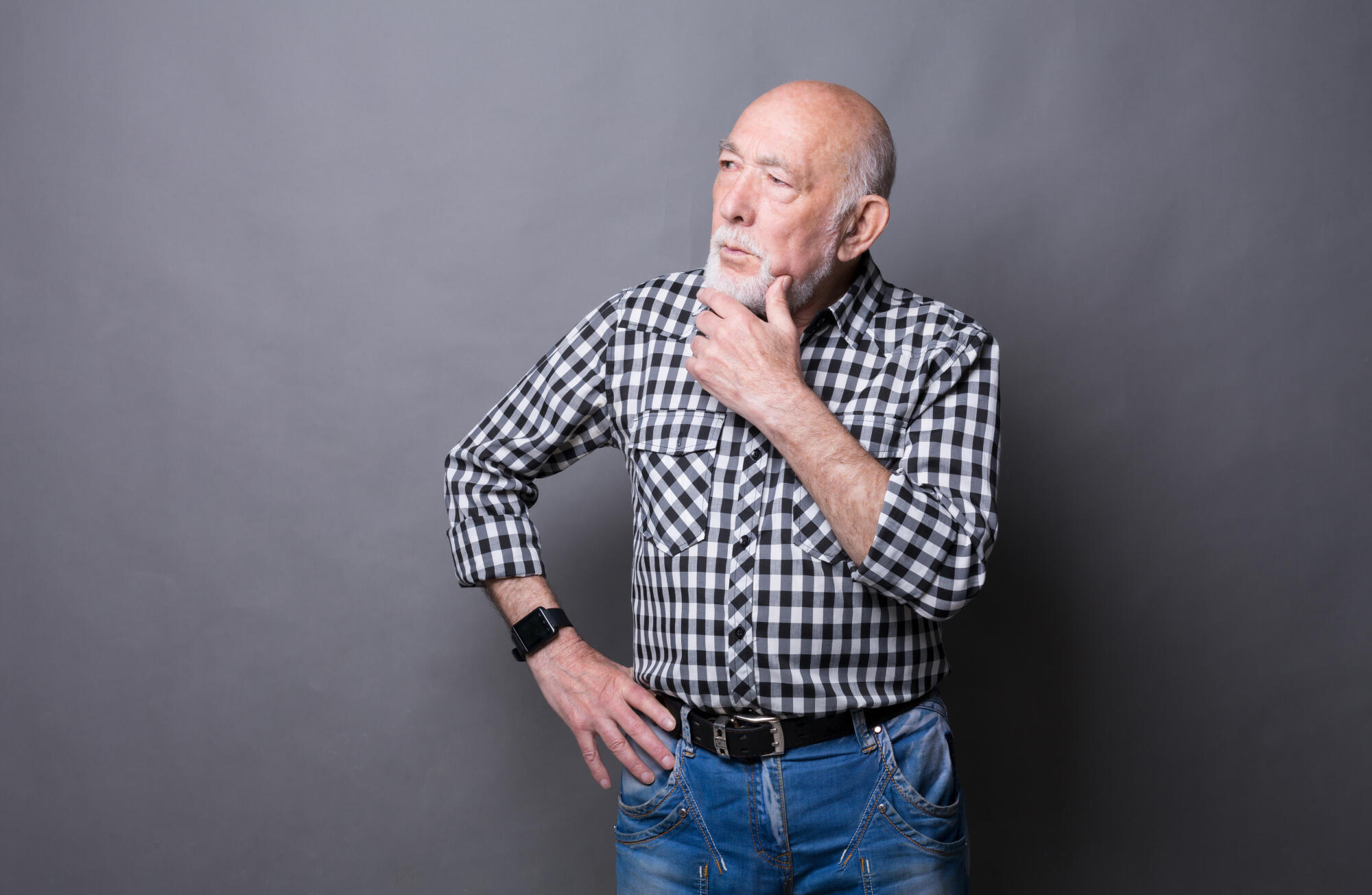 Pensive mature man looking away, copy space Pensive mature man looking away, copy space