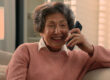 Happy laughing talking phone Caucasian old woman carefree senior lady listening funny news smile laugh retired grandma elderly female grandmother mobile conversation smartphone communication at home