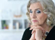 Close up portrait of sad senior woman