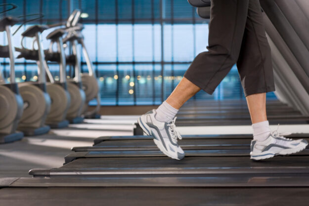 Detail,Of,Active,Woman,Running,On,Treadmill,In,Health,Club Detail,Of,Active,Woman,Running,On,Treadmill,In,Health,Club