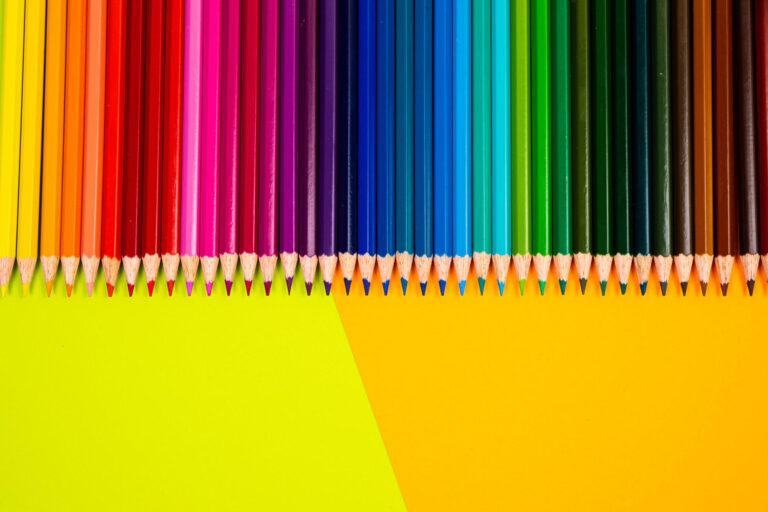 multi colored pencils on multi colored background, Close up, copy space, Modern art. Modern design