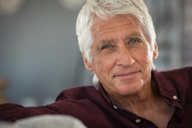 Portrait,Of,Happy,Senior,Man,Smiling,At,Home.,Old,Man