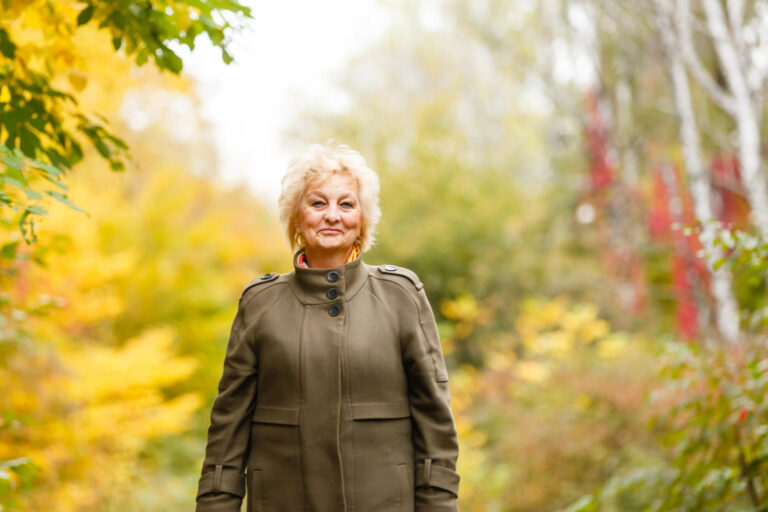 Senior citizen stroll in a park in autumn Senior citizen stroll in a park in autumn