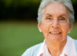 Portrait,Of,A,Lovely,Elder,Woman,Smiling,Outdoors