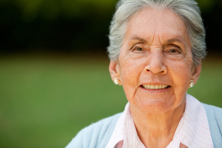 Portrait,Of,A,Lovely,Elder,Woman,Smiling,Outdoors Portrait,Of,A,Lovely,Elder,Woman,Smiling,Outdoors