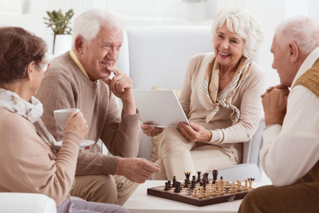 Chess,Competition,Between,Two,Older,Friends,In,Nursing,Home Chess,Competition,Between,Two,Older,Friends,In,Nursing,Home