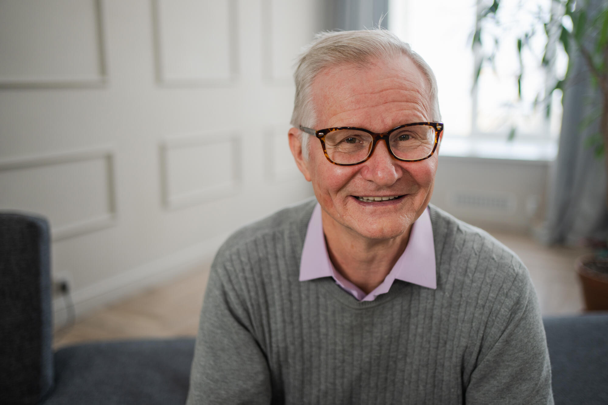 Portrait of confident stylish European middle aged senior man at home. Older mature 70s man smiling. Happy attractive senior grandfather looking camera close up face headshot portrait. Happy people. Portrait of confident stylish European middle aged senior man at home. Older mature 70s man smiling. Happy attractive senior grandfather looking camera close up face headshot portrait. Happy people.