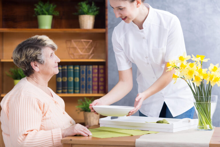 Caregiver,Serving,Nutritious,Soup,To,Senior,Lady Caregiver,Serving,Nutritious,Soup,To,Senior,Lady