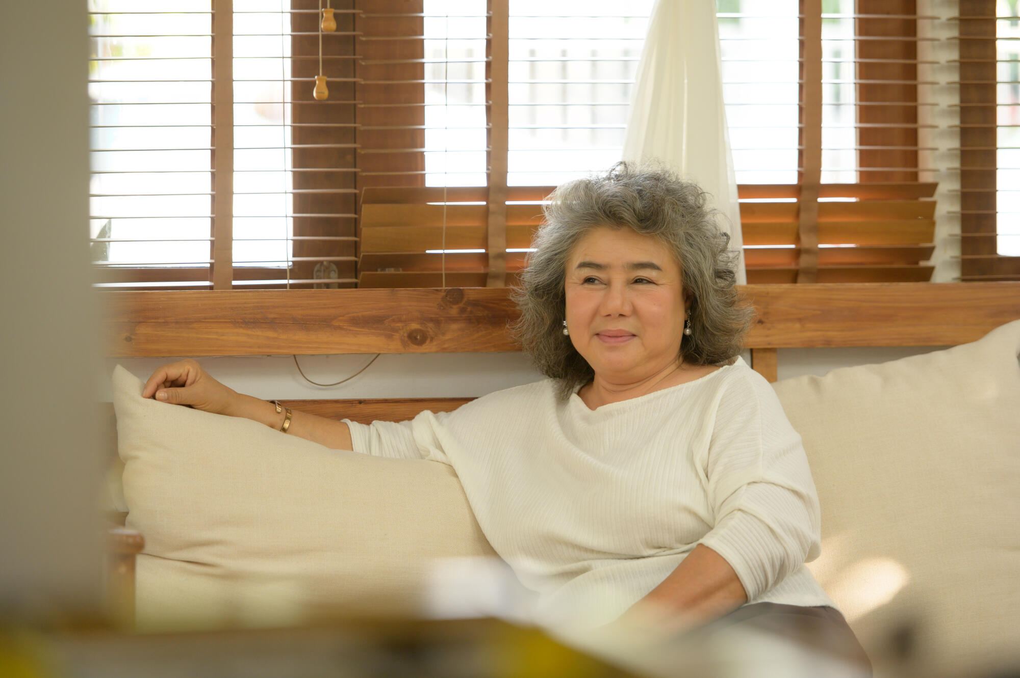 An elderly woman who has to look after himself without children