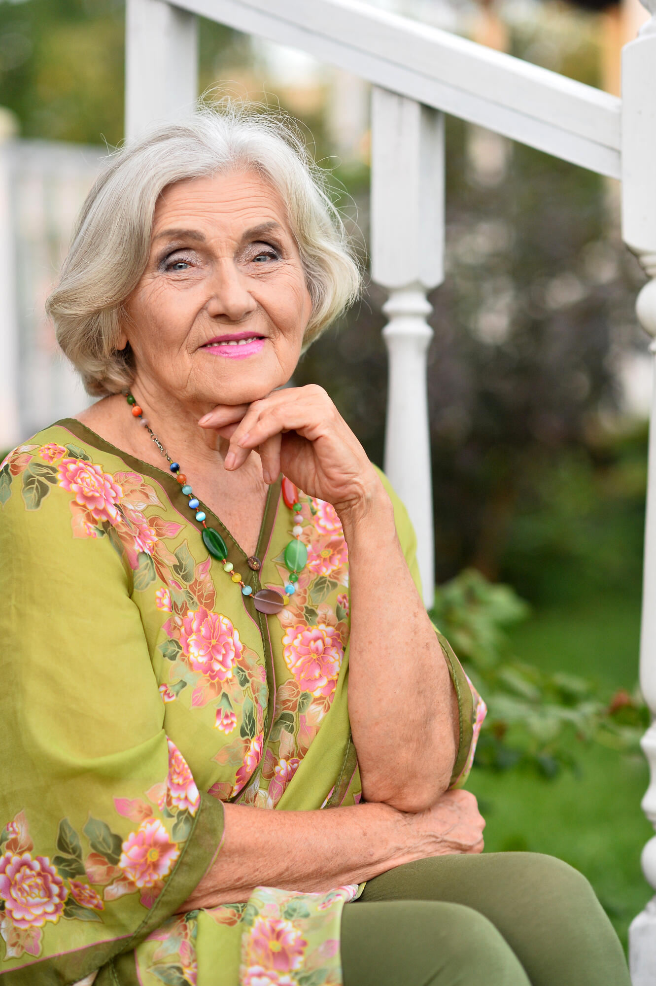 Portrait of a beautiful woman in the park in summer