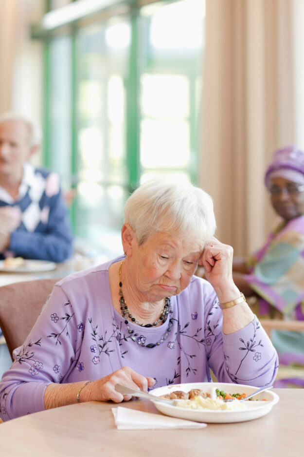A,Senior,Woman,Having,Lunch,Looking,Sad