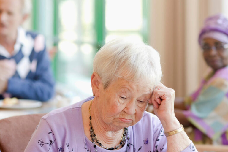 A,Senior,Woman,Having,Lunch,Looking,Sad