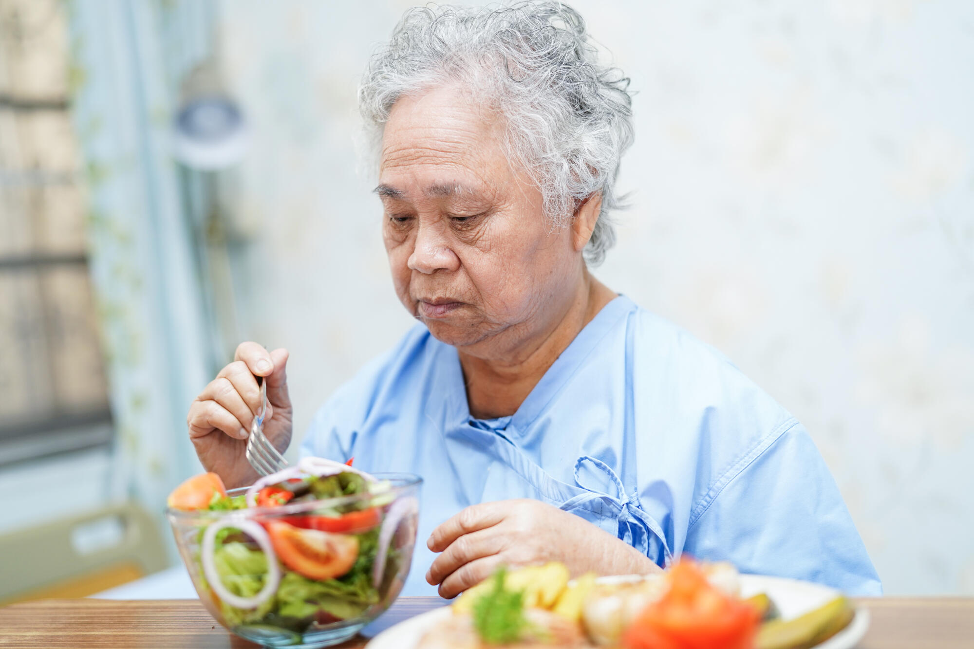 Asian senior woman patient eat (1) Asian senior woman patient eat (1)