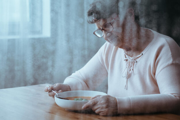 Sad,Older,Woman,Eating,Tomato,Soup,Alone Sad,Older,Woman,Eating,Tomato,Soup,Alone