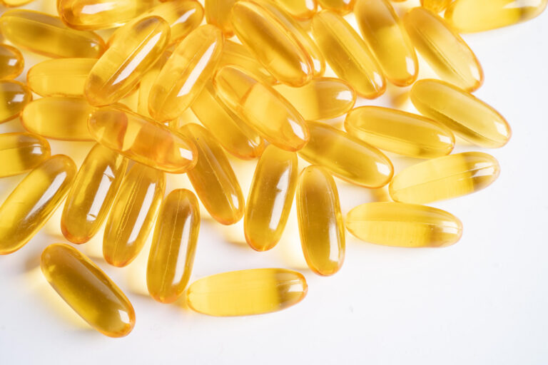 Fish oil Omega 3 capsules vitamin with EPA and DHA isolated on w